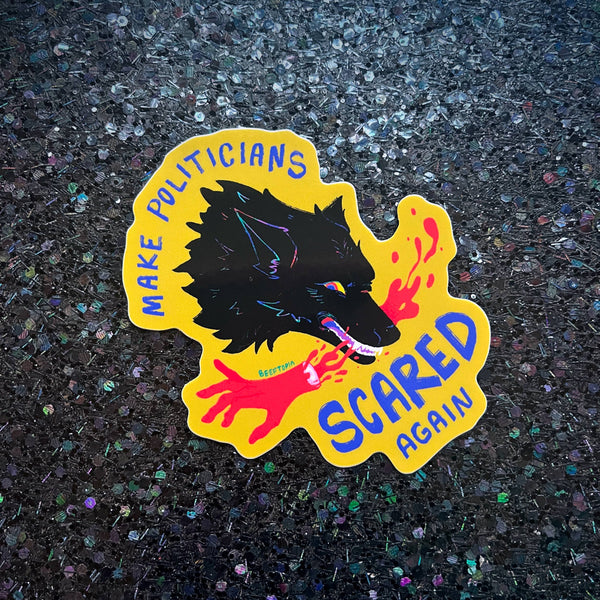 Sticker with a wolf design and text on a textured surface