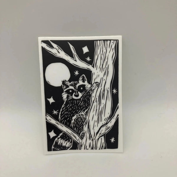 Illustration of a raccoon in a tree with a moon and stars on a white background