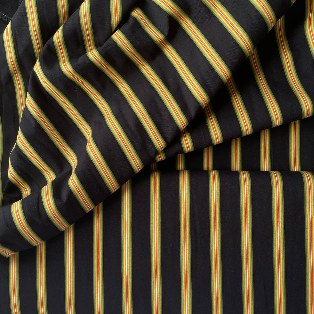 Black fabric with multicolored diagonal stripes