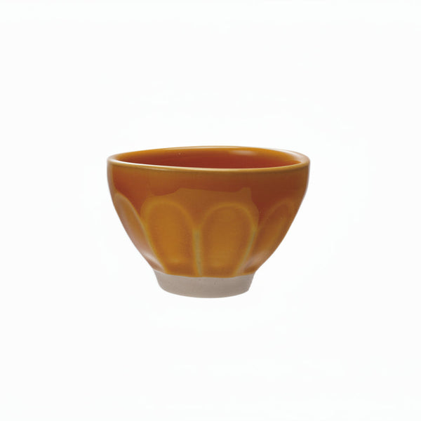 small stoneware bowl with golden yellow glaze