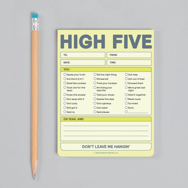 Notebook titled 'High Five' with a pencil on a gray background