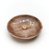 Wooden bowl with star constellation design on a white background